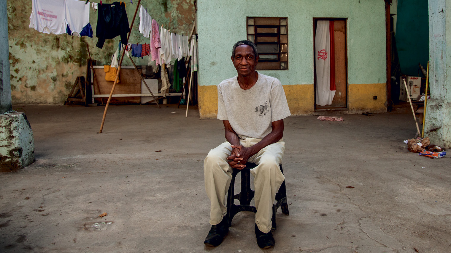 Paulo Cezar de Paula, 62, in the abandoned warehouse his family and two others have been occupying for the past three years. De Paula was evicted from the Quilombo das Guerreiras occupation in 2013 to make space for the Trump Towers Rio