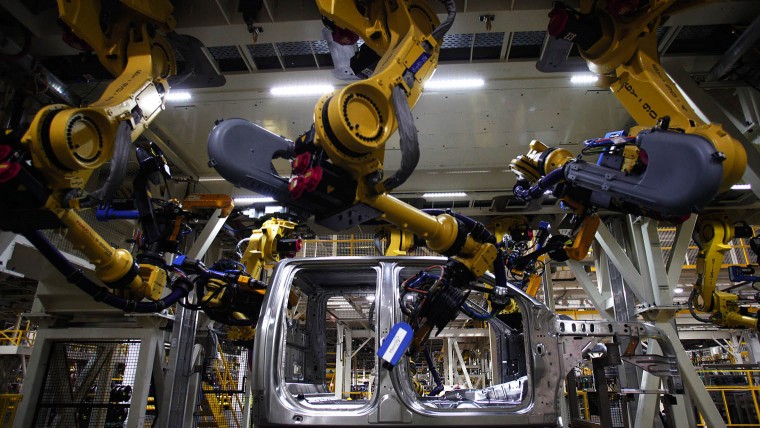 Robotic arms on the F-150 truck assembly line at Ford’s plant in Dearborn, Michigan