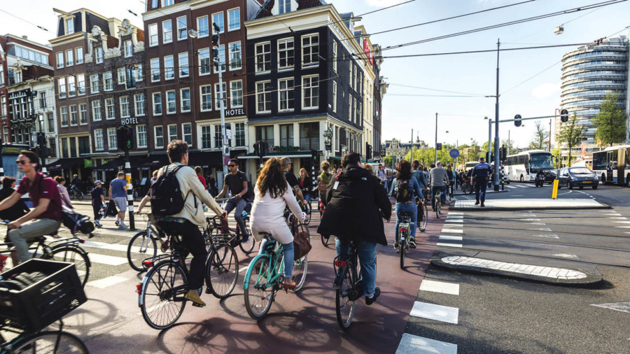 People cycling in Amsterdam