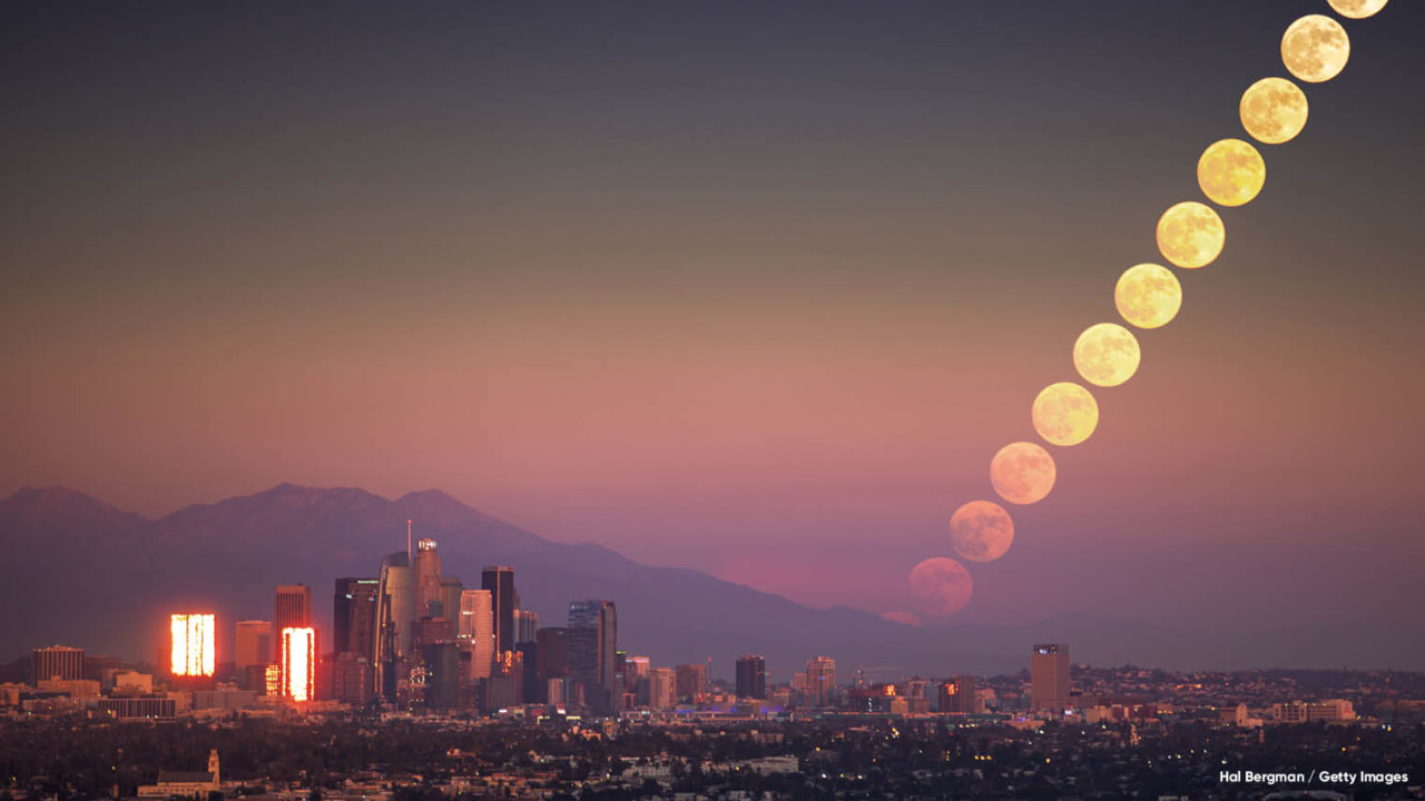 Sunset and numerous moons in the sky