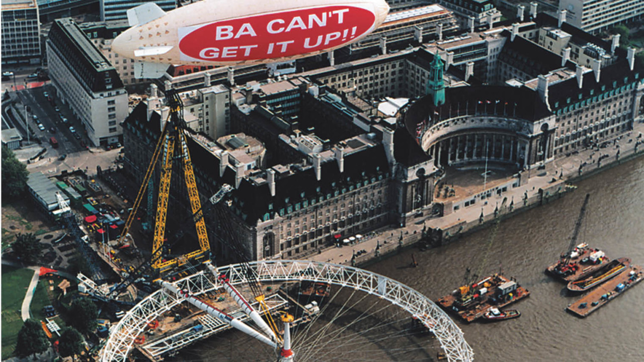 Virgin blimp displays the sign “BA can’t get it up!!” after the then British Airwayssponsored London Eye had a technical problem erecting the wheel