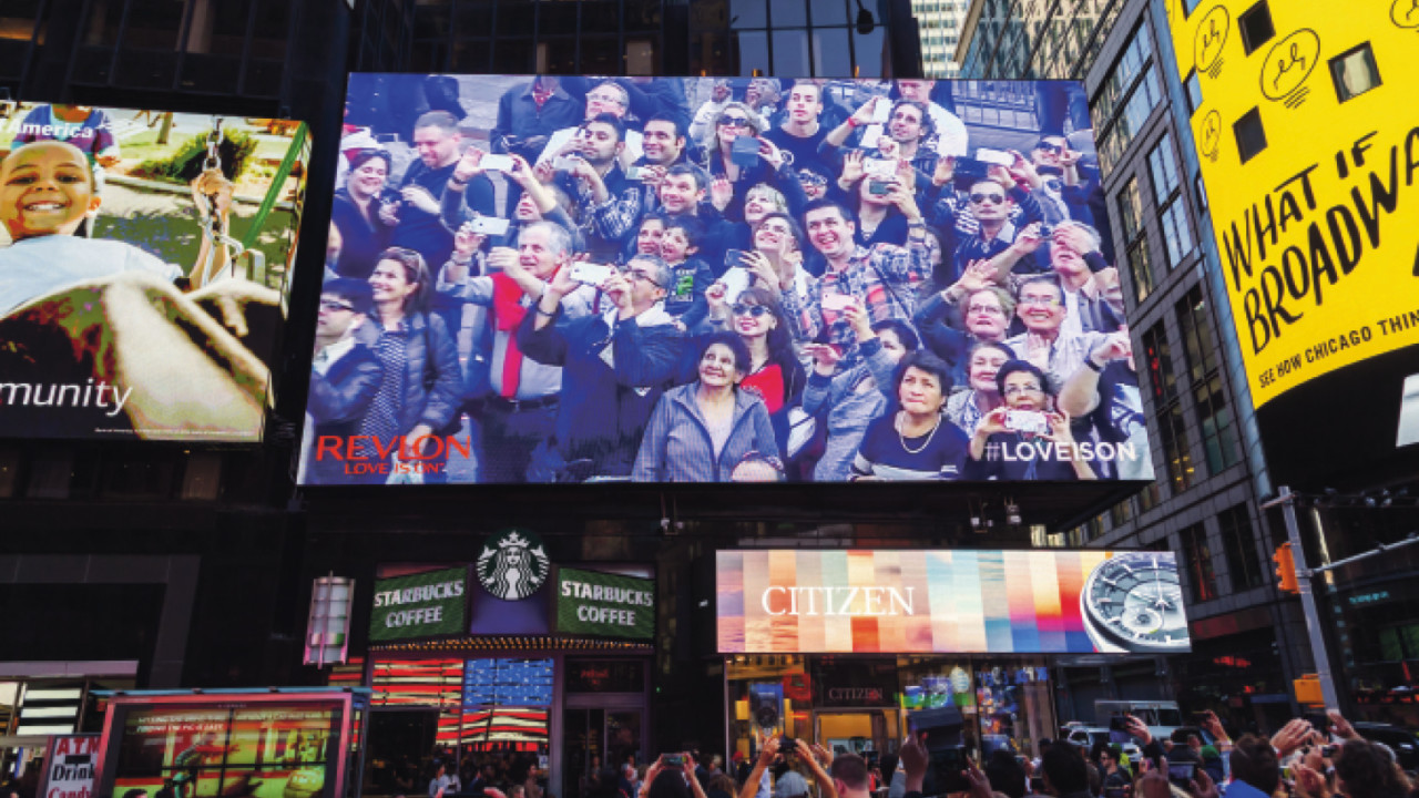 The big screen at New York’s Times Square displaying live video of pedestrians as they walk by
