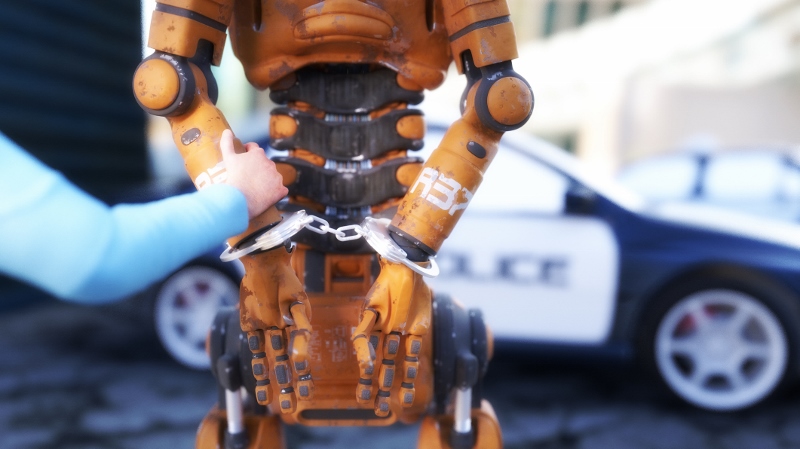 Arrested robot with handcuffs