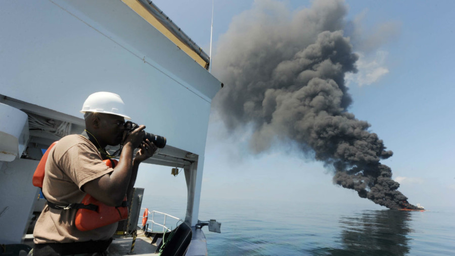 US Navy crew documenting controlled burn after Deepwater Horizon disaster