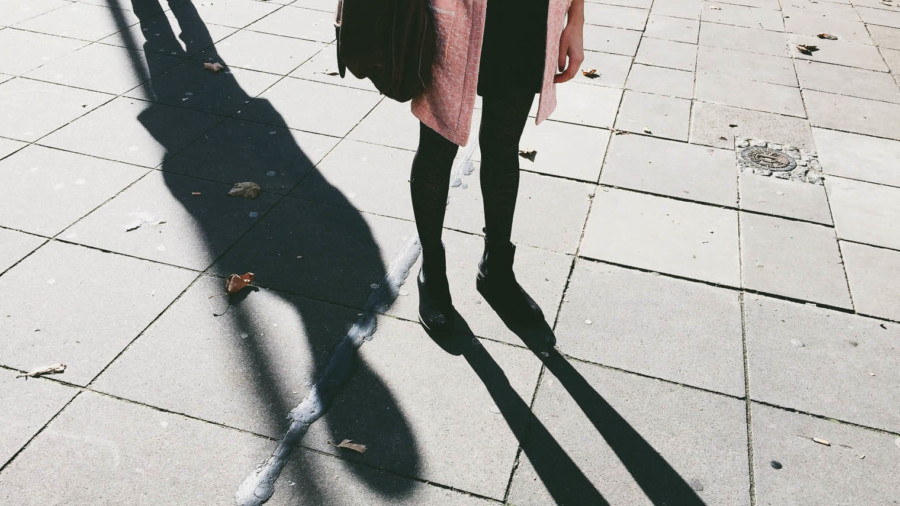 woman standing on street