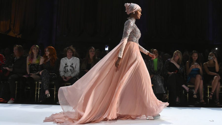 woman in modest fashion on the catwalk