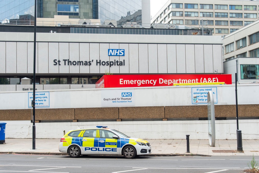 A police car parked outside the emergency department at St