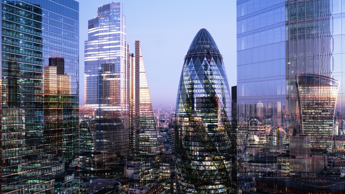 UK, London, multiple exposure, elevated view of high rise financial buildings in the city, illuminated at dusk