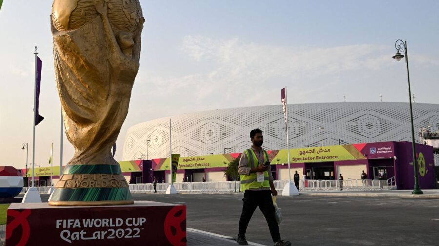 A man walks outside the Al-Thumama Stadium in Doha on November 8, 2022, ahead of the Qatar 2022 FIFA World Cup football tournament