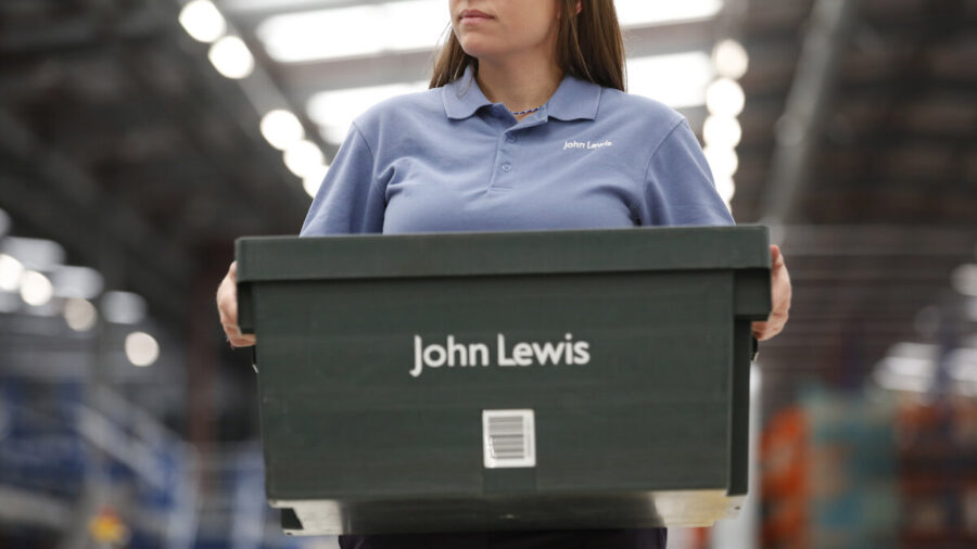 A John Lewis partner working in the company's distribution centre
