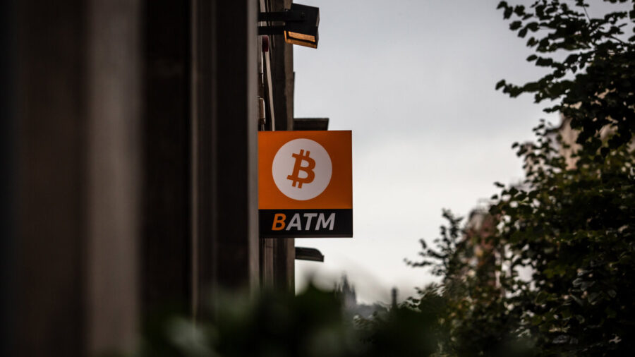 Sign advertising a bitcoin atm